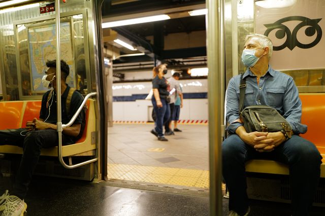 Masked New Yorkers ride the subway on Sept. 5, 2020.